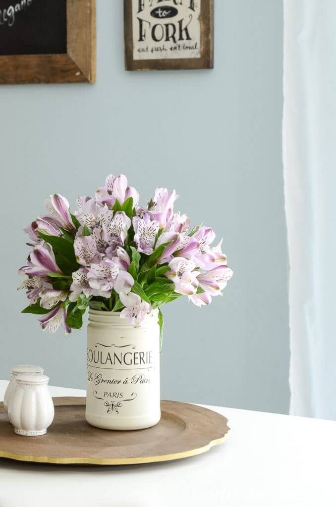 diy wood sign with vase of flowers