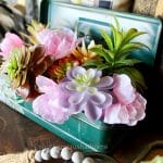 close up of vintage toolbox planter