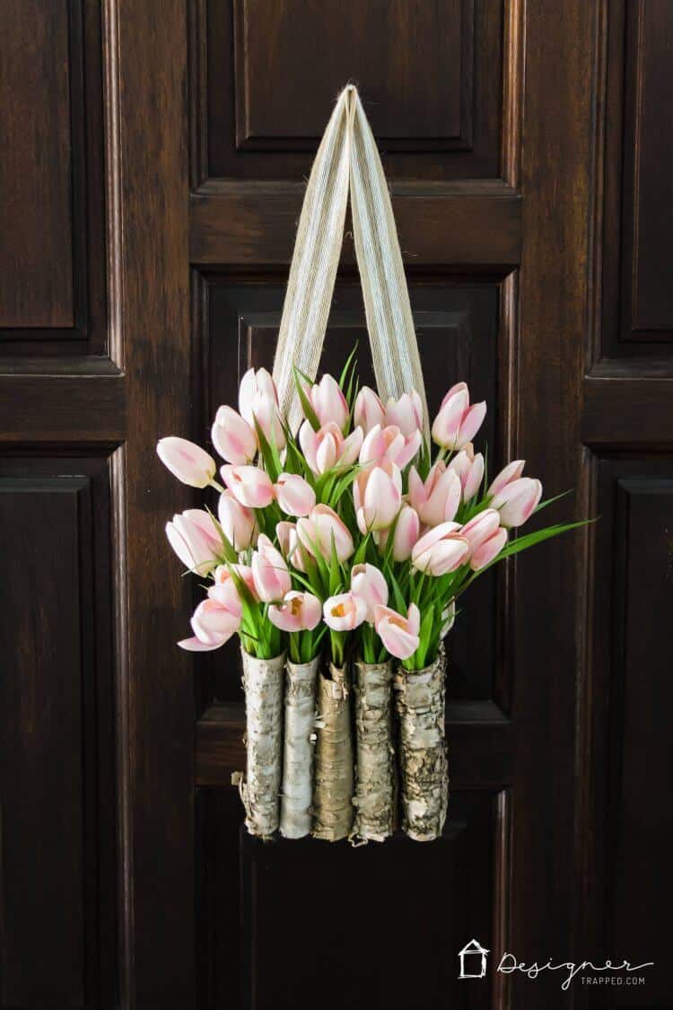 tulip in wood basket on door