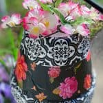 tissue paper and flowers on clay pot wind chime