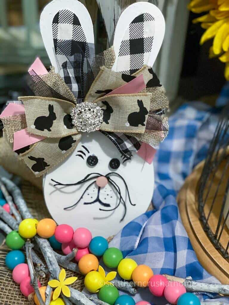 dollar tree paddle ball bunny on table with wood beads