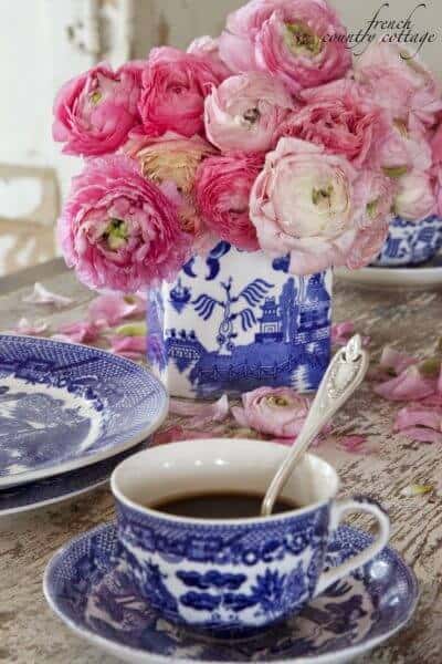 blue and white table decor with peonies