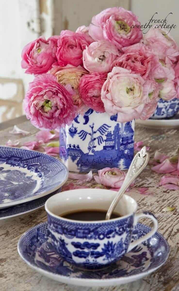 blue and white table decor with peonies