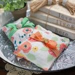 swaddle blanket muslin sachets styled on tray