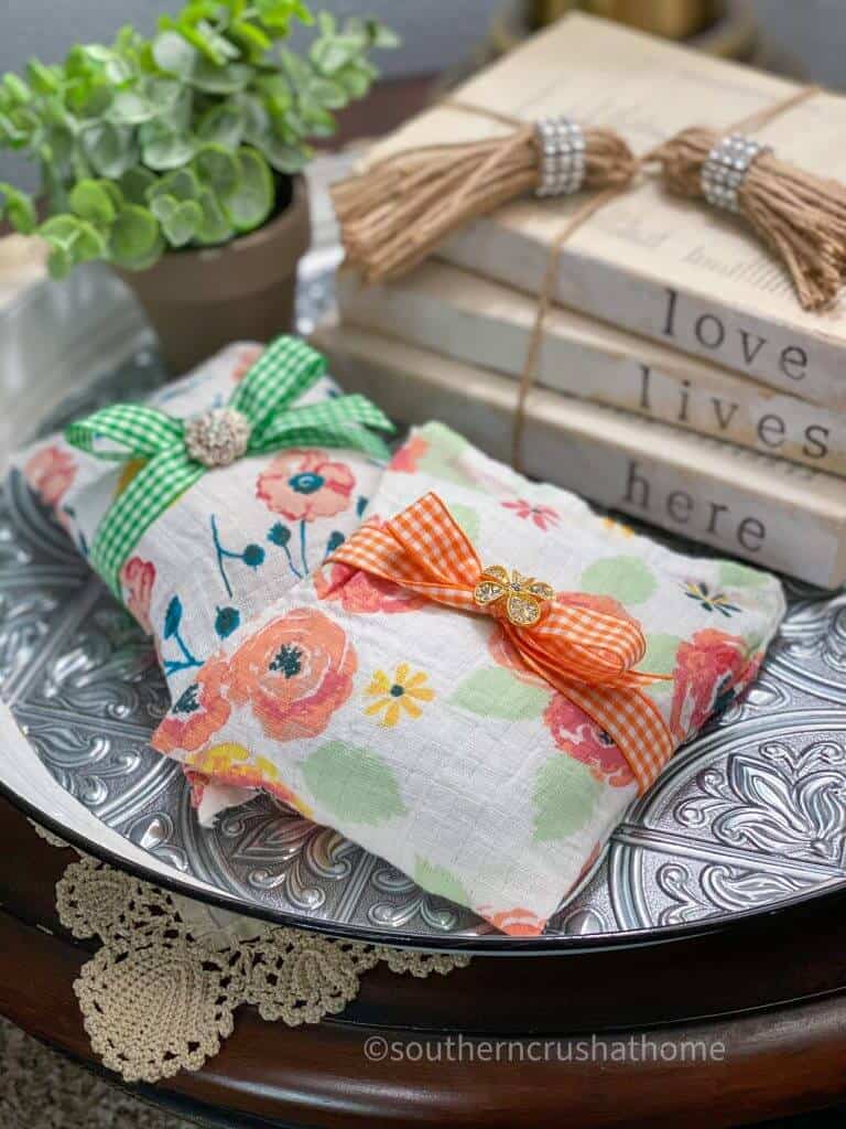 swaddle blanket muslin sachets styled on tray