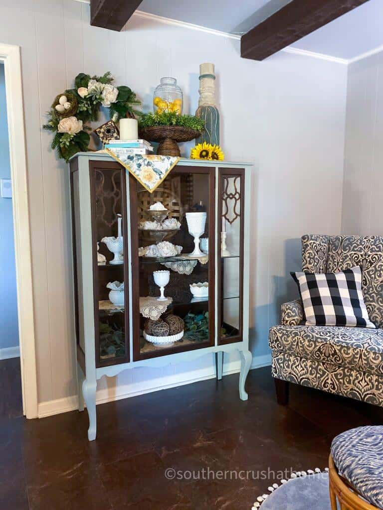 completed vintage cabinet makeover with collection