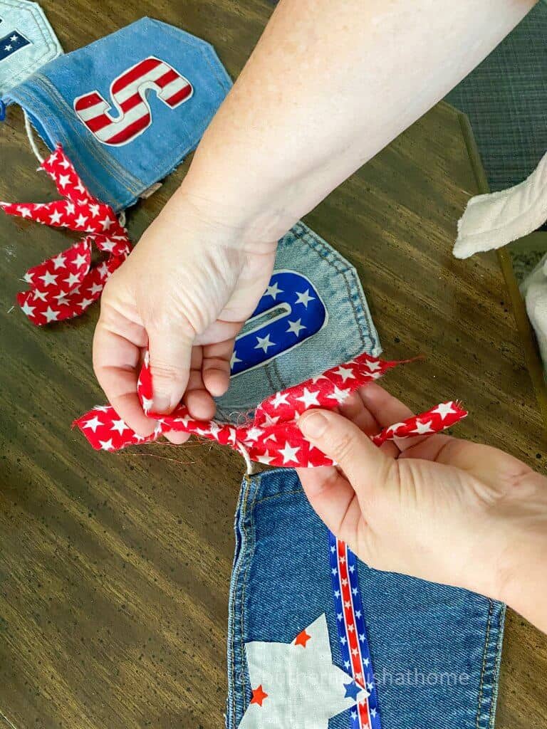 adding trim and ribbon to jean pockets