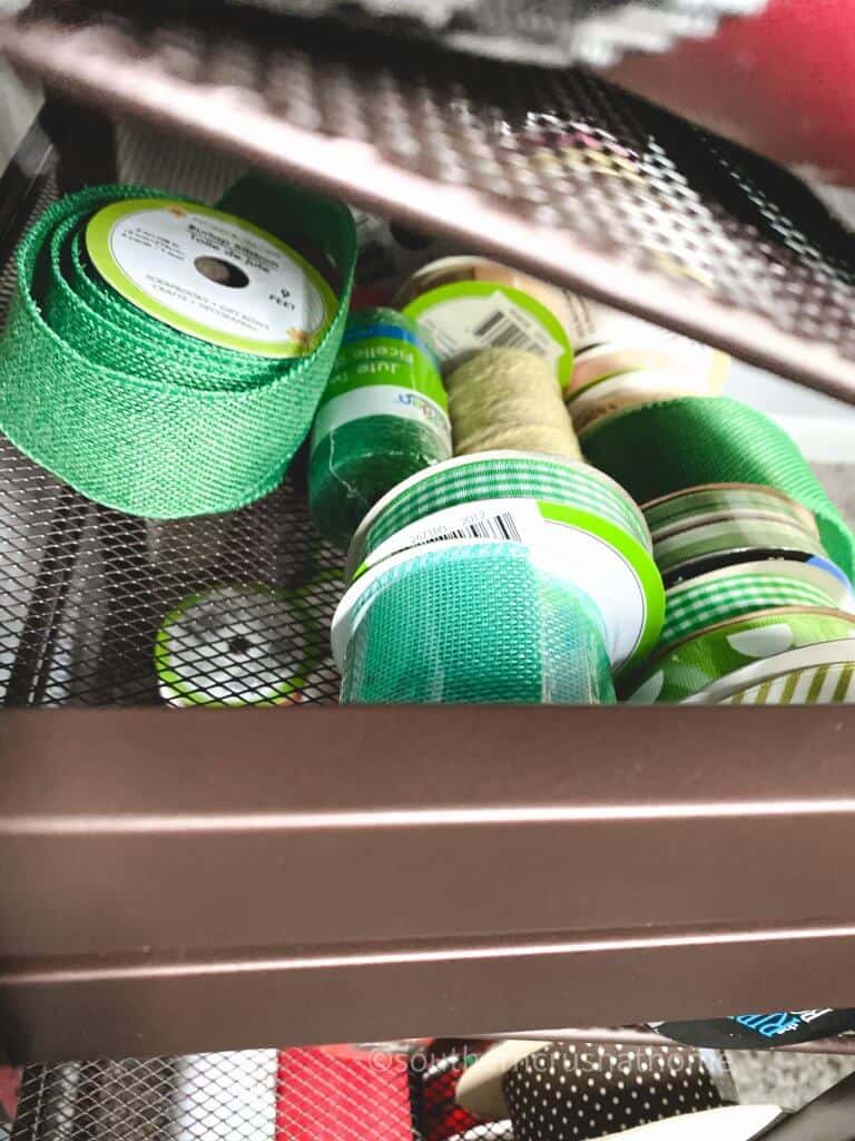 green ribbons on storage rack