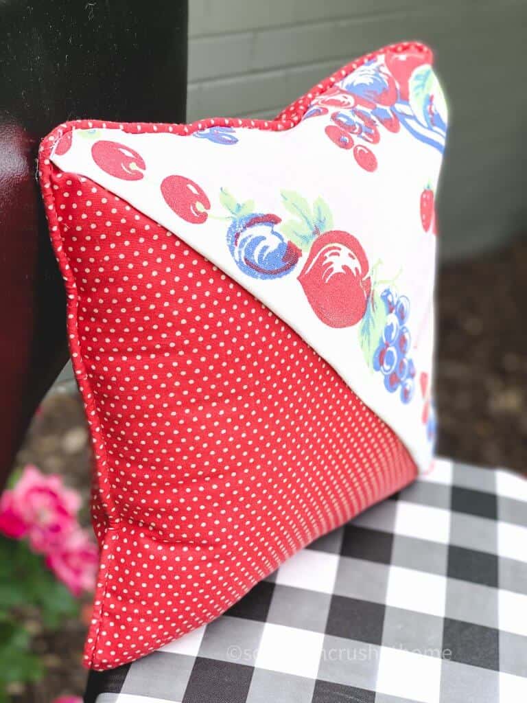 thrift store pillow makeover on chair