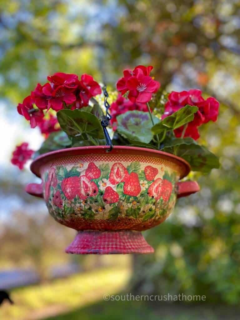 Upcycled Vintage Hanging Colander Planter hanging outside