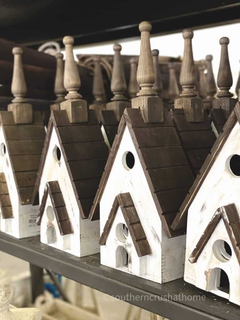 row of wooden bird houses