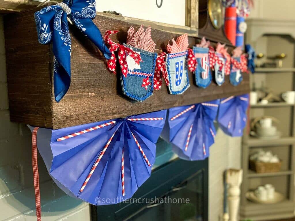 Dollar Tree Gift Bag Patriotic Bunting hanging on mantel