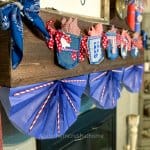 Dollar Tree Gift Bag Patriotic Bunting hanging on mantel