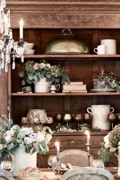 dining room hutch with flowers