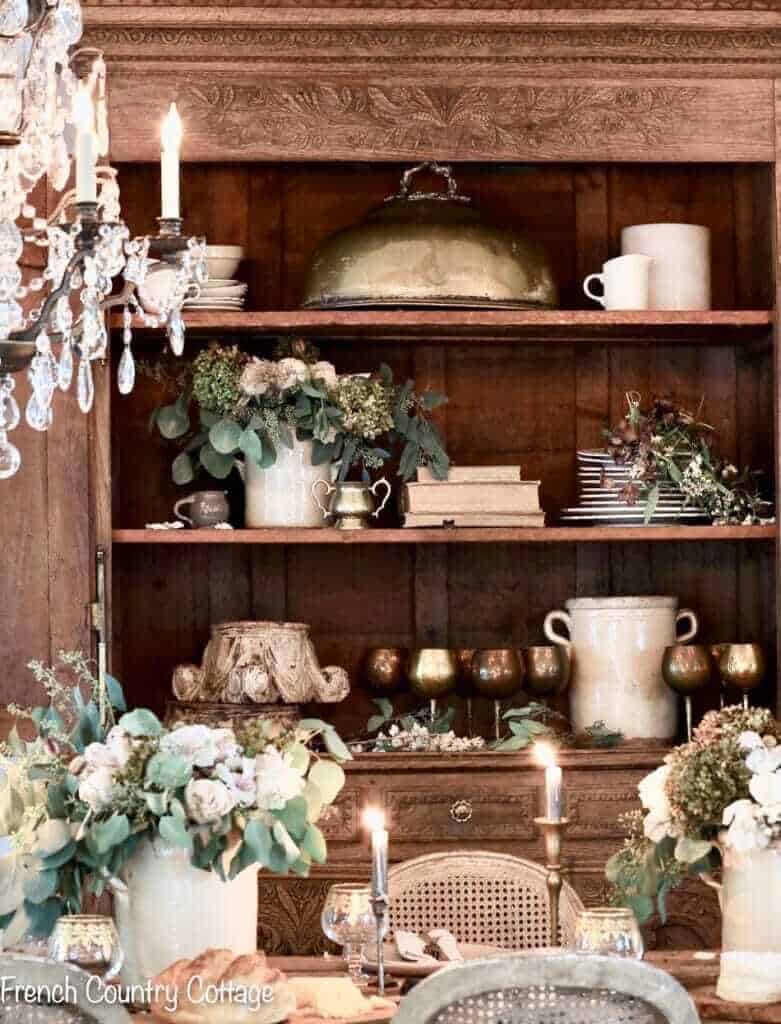 dining room hutch with flowers