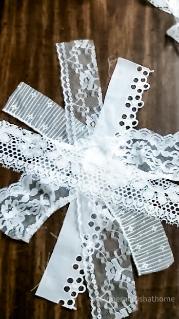 lace messy bow being put together on table