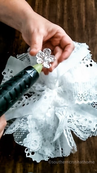 adding rhinestone to lacy bow