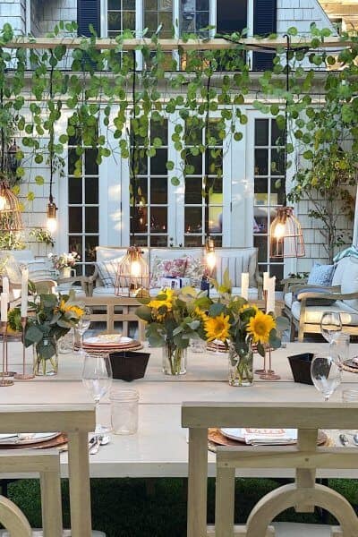 outdoor dining with sunflowers