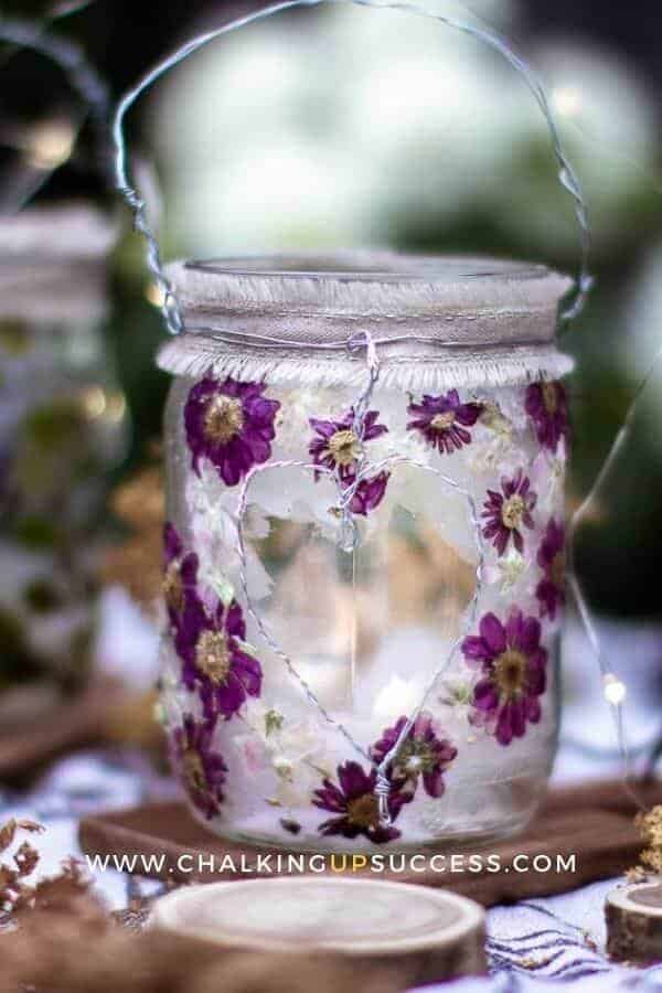 pressed flowers in glass jars