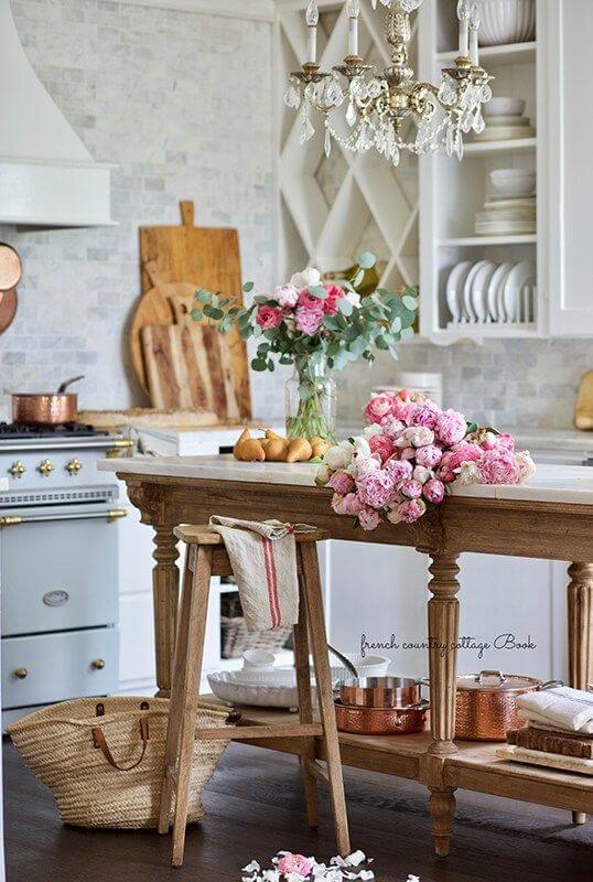 kitchen view with flowers and cutting boards