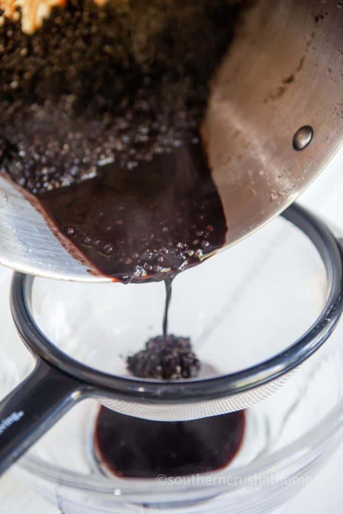 straining elderberry syrup