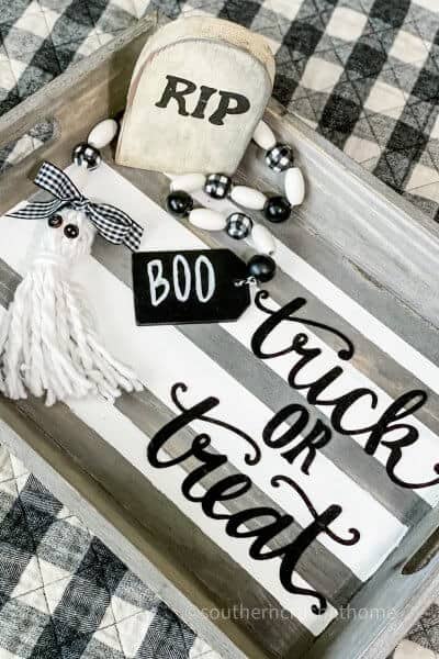 buffalo check garland on tray for Halloween