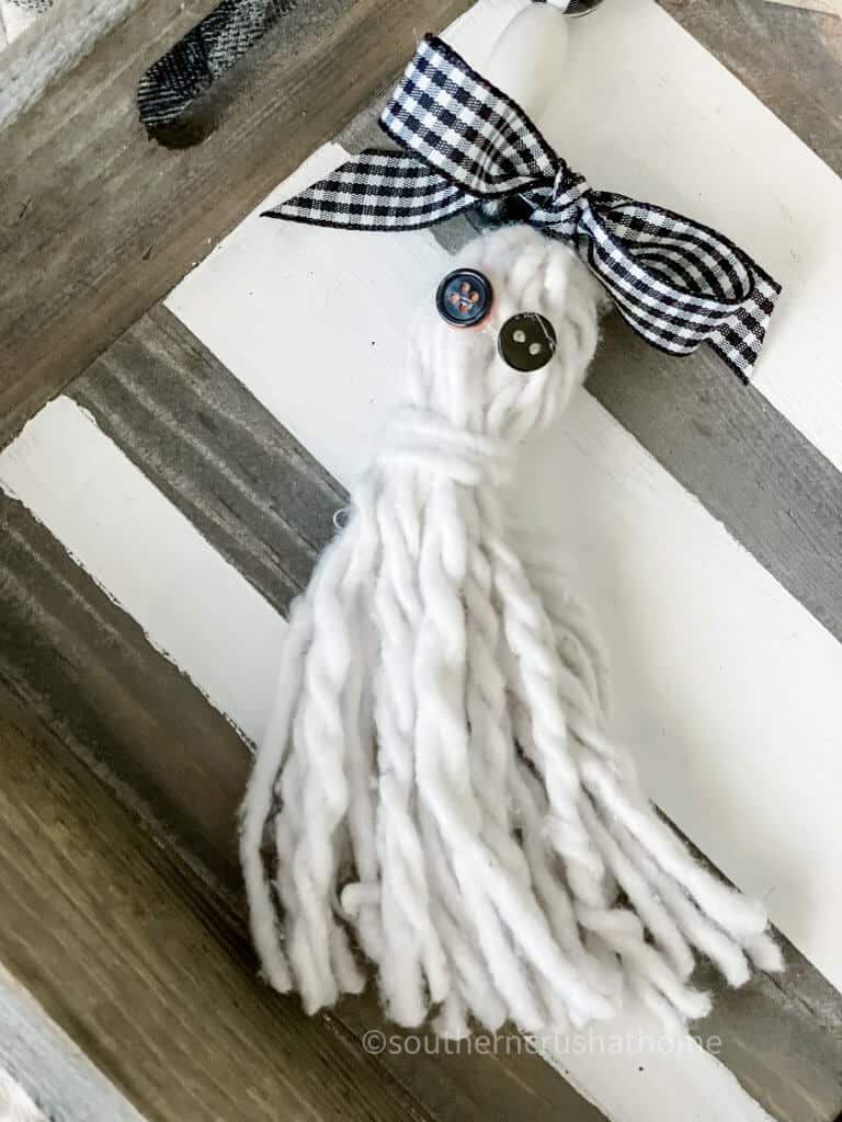 close up of dollar tree mop head ghost