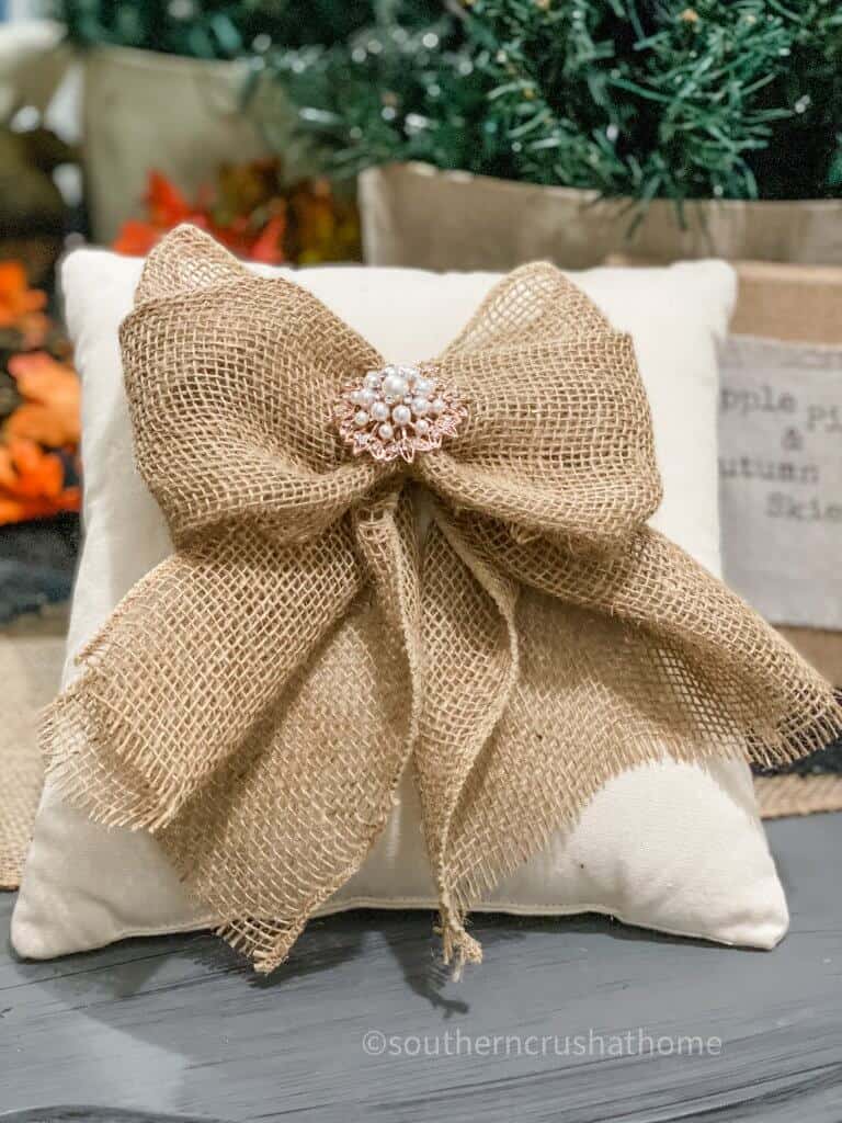 burlap bow shown on pillow