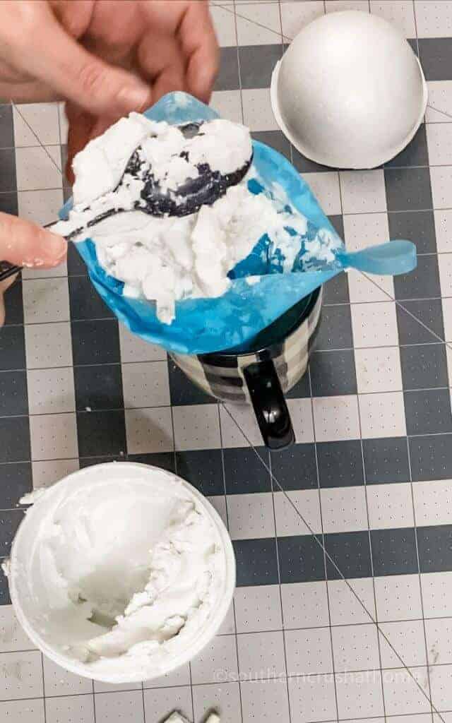 adding faux whipped cream to mug