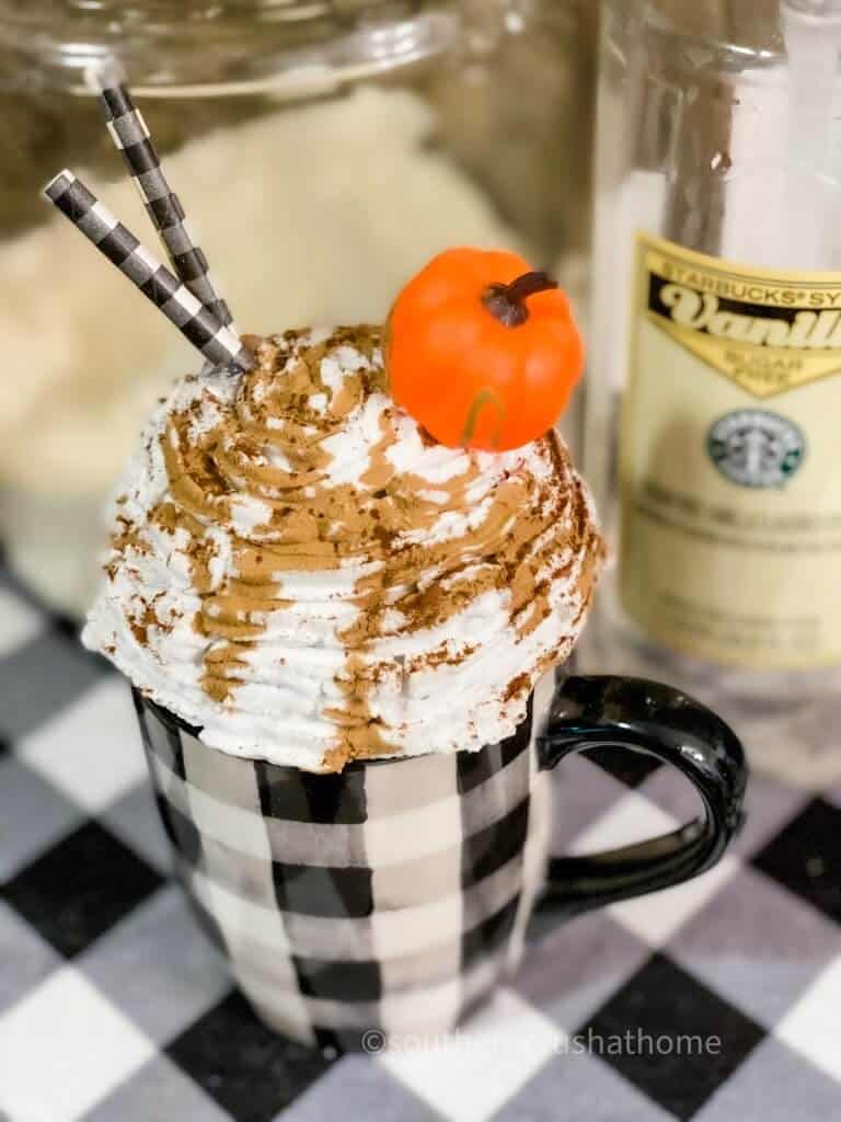 whipped cream mug topper in buffalo check mug with pumpkin