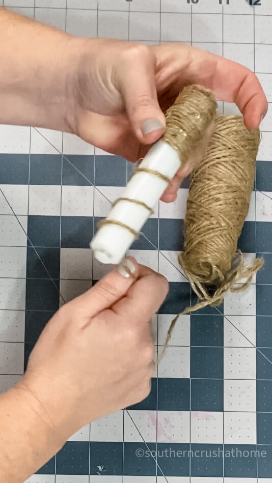 adding twine to candlestick