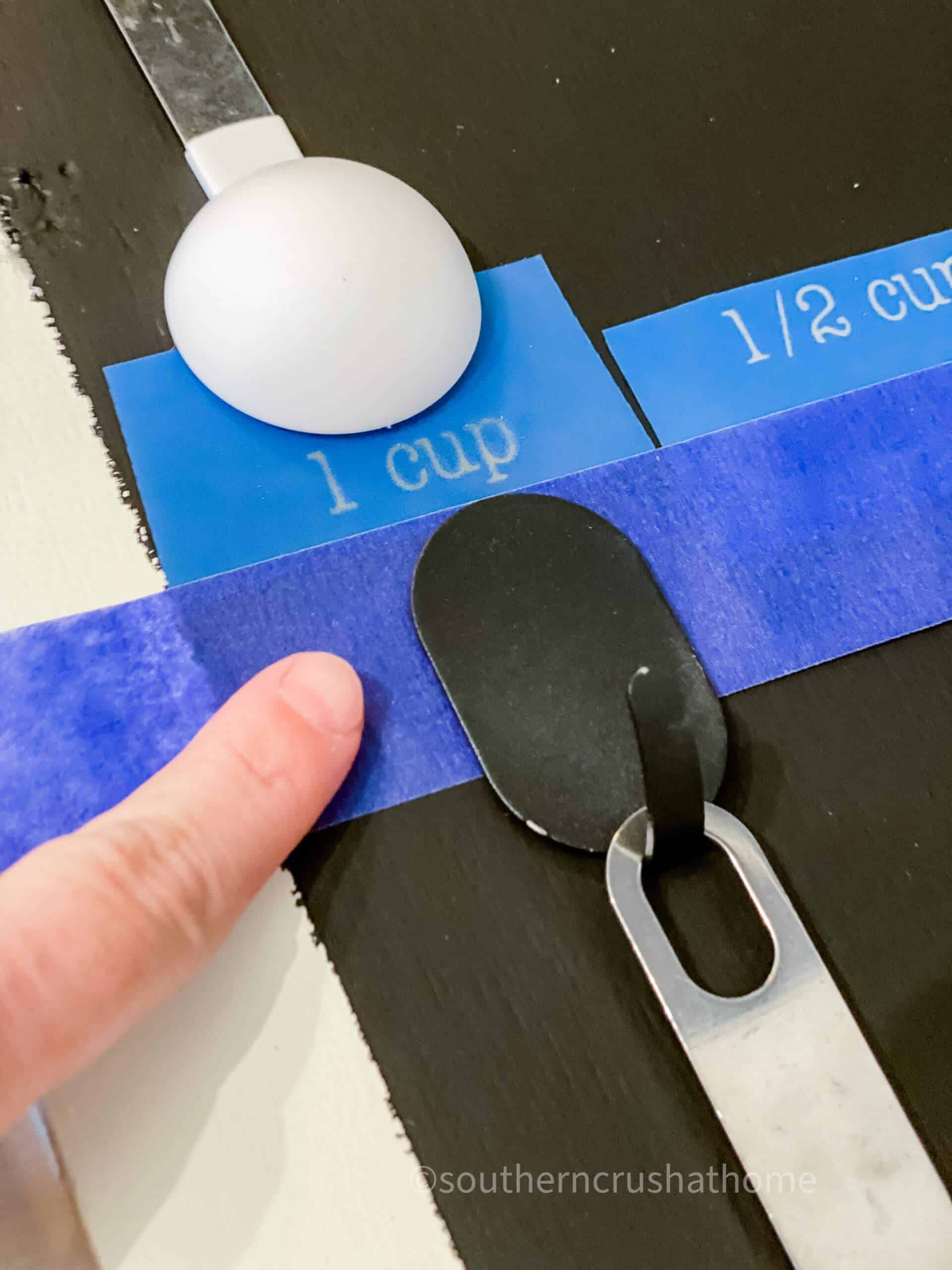 lining up stencils on chalkboard