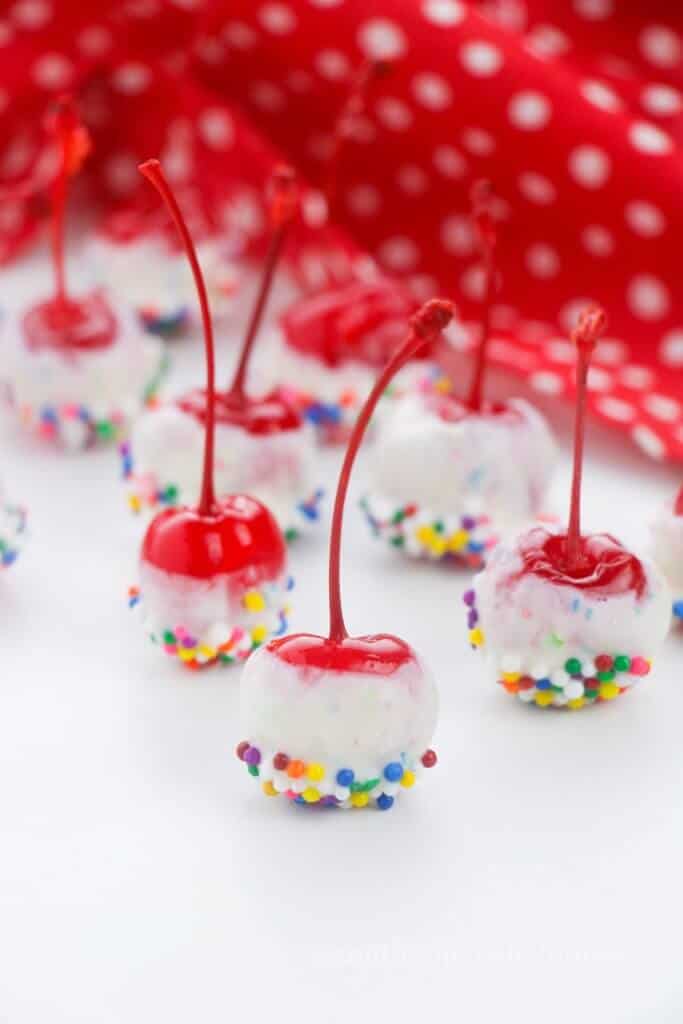 close up of sprinkle dipped cherries