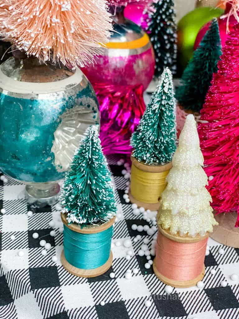 close up of wooden spool trees