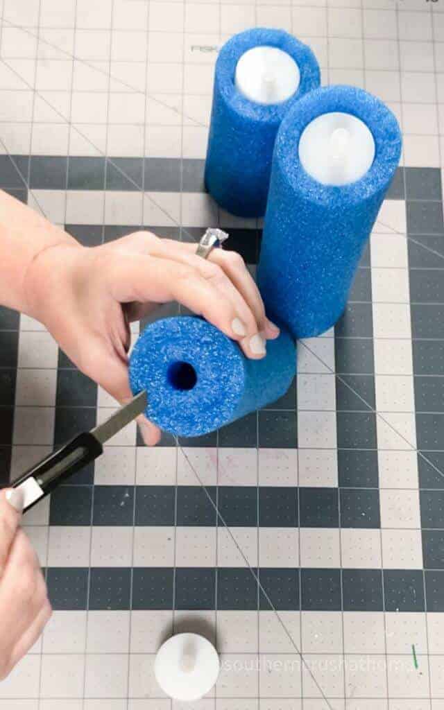 cutting center of pool noodle for candle