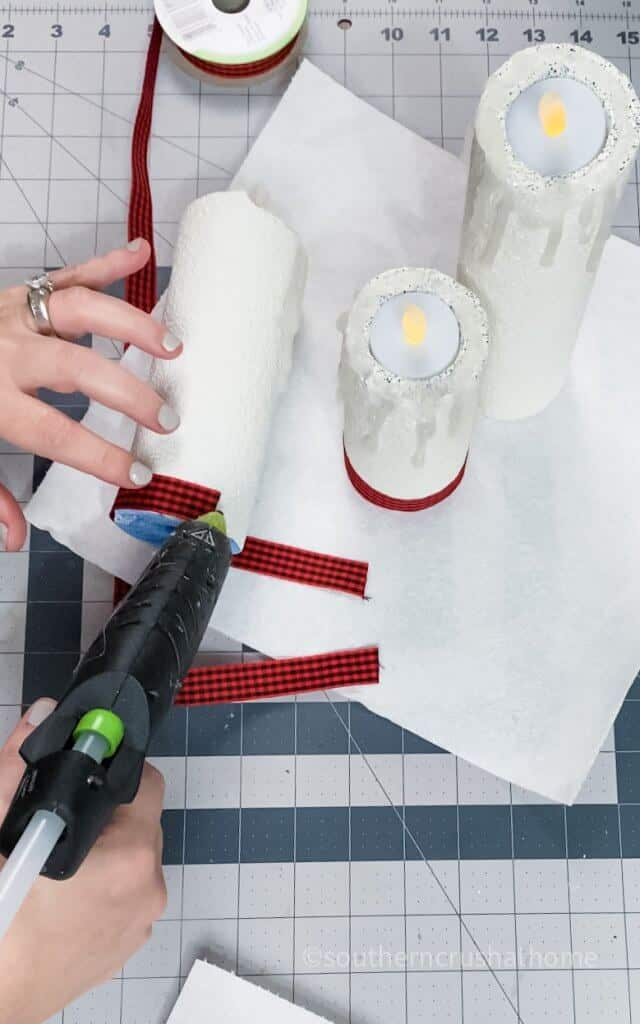 gluing ribbon around candle base