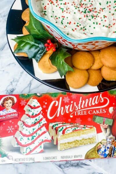 little debbie christmas tree cakes dip in festive bowl with box
