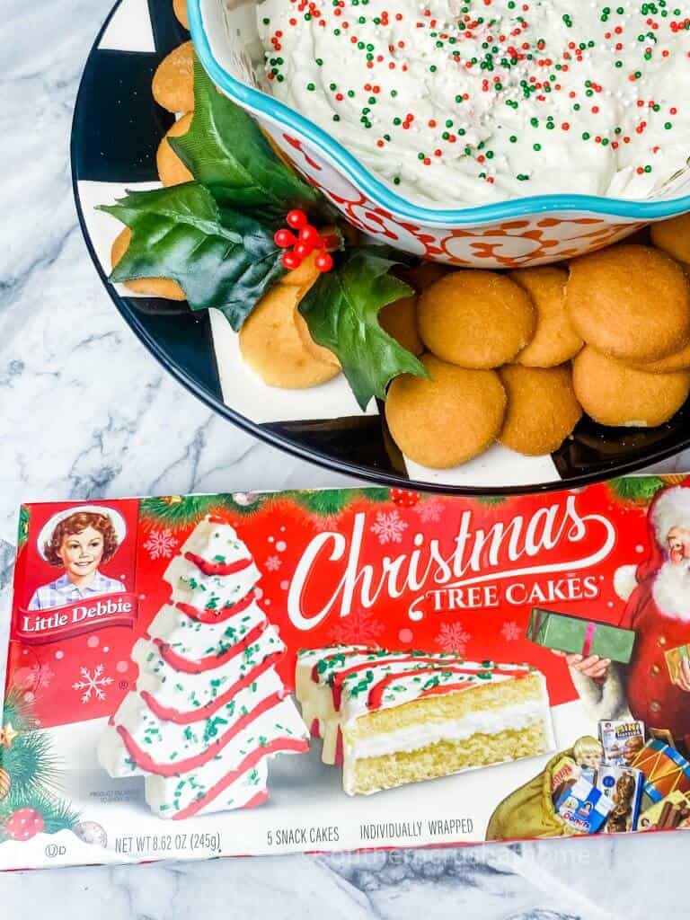 little debbie christmas tree cakes dip in festive bowl with box