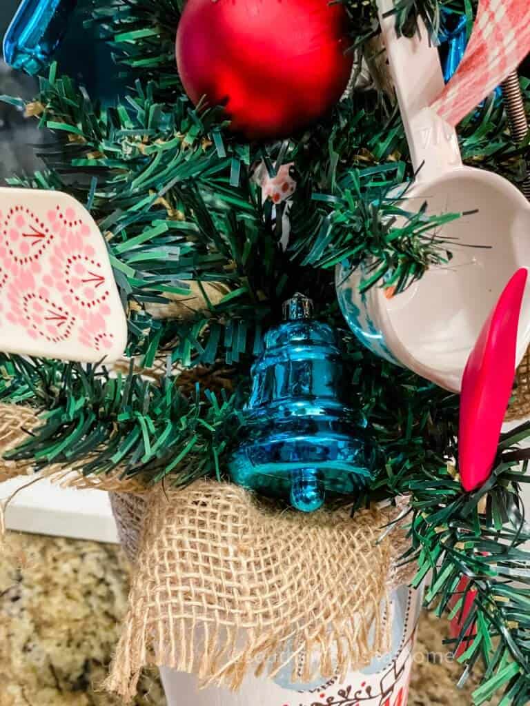 adding ornaments to kitchen tree
