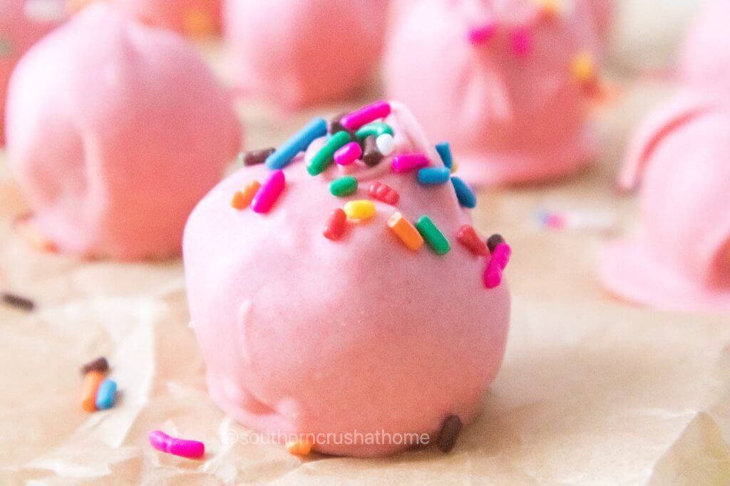 close up of oreo truffle with sprinkles