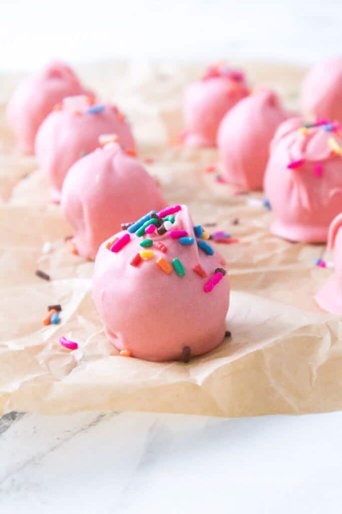 pink oreo truffles with sprinkles