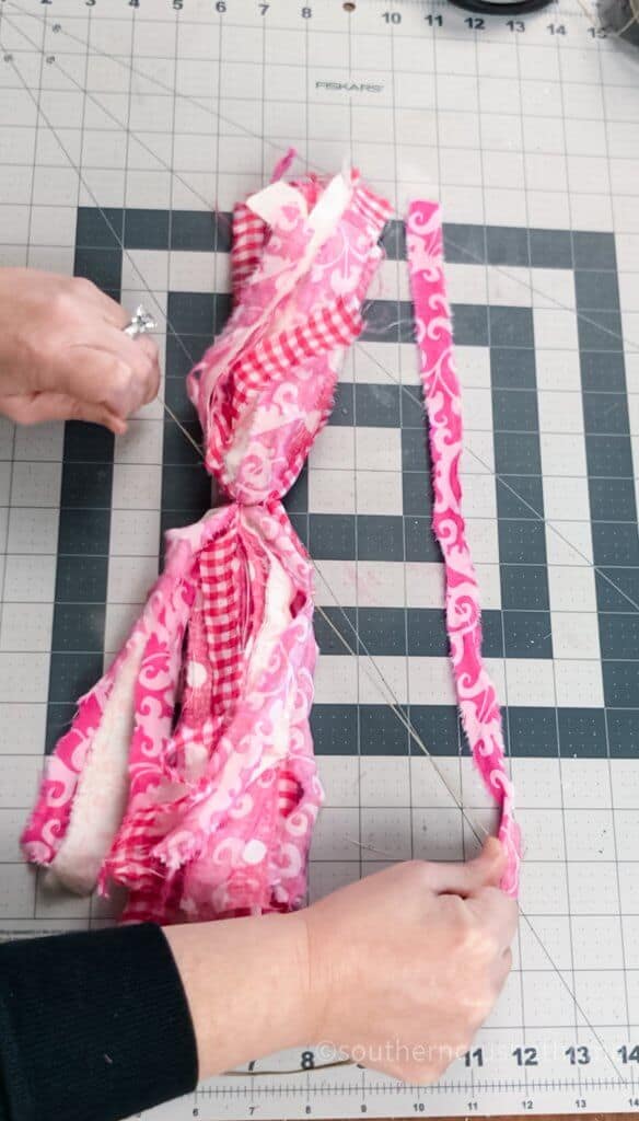 tying fabric scraps in half