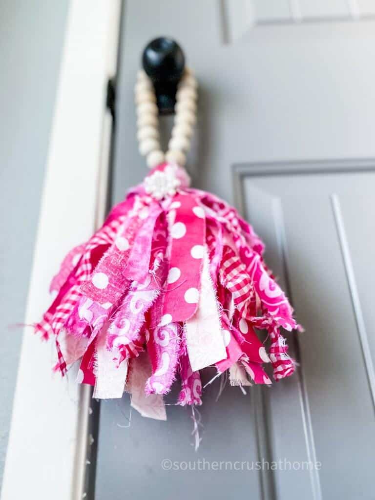 hot pink and white fabric tassel