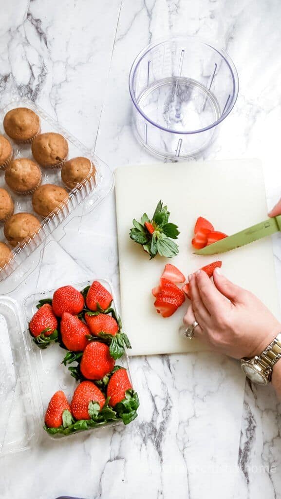 slicing strawberries for trifle