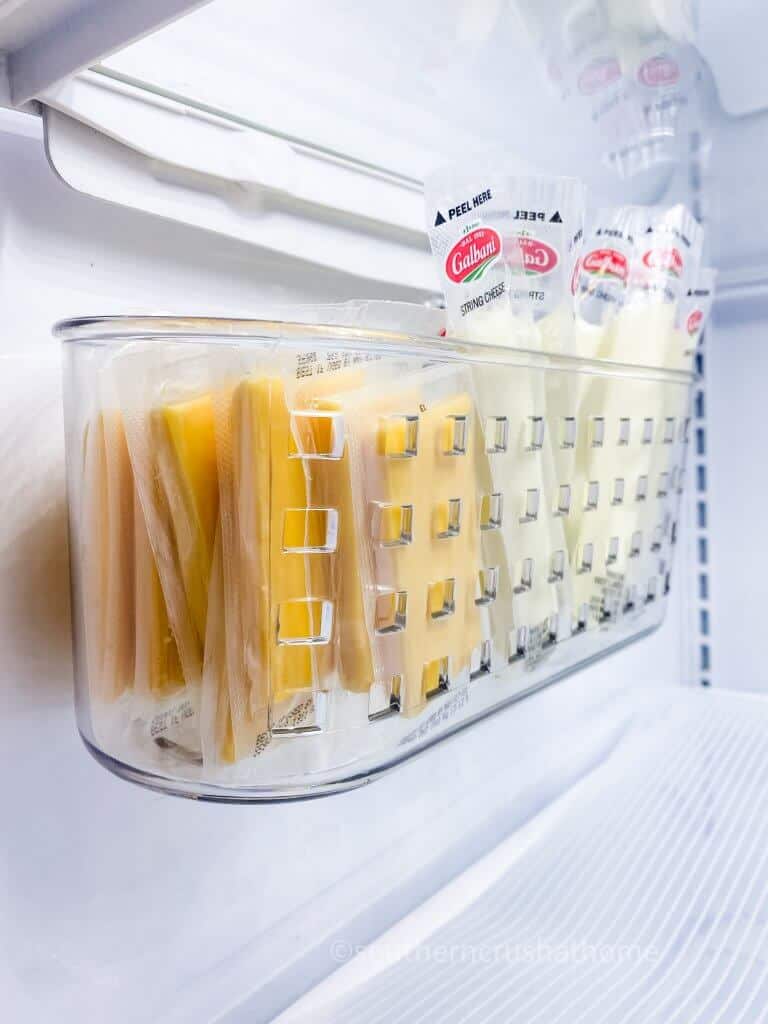 cheese in container inside fridge