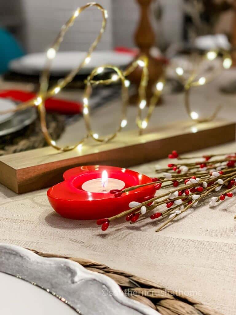 tealight candle holder on table with lights