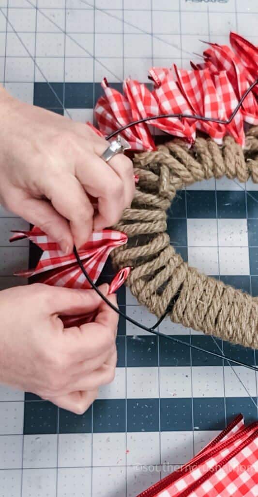 3 heart shaped wire wreath forms wrapped with rubber drawer liner