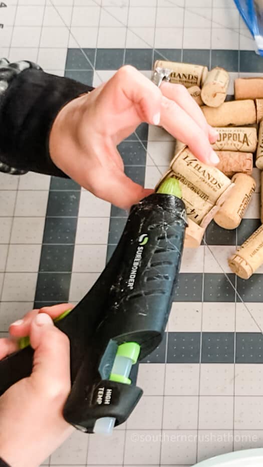 hot gluing wine corks for heart