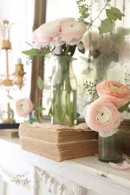 pink flowers on mantel