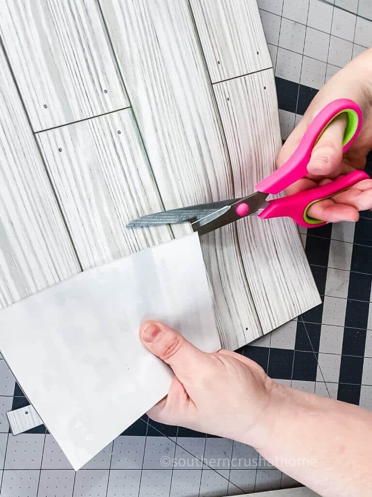 cutting wallpaper for moss frame